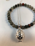 Oil diffusing necklace tear drop cage